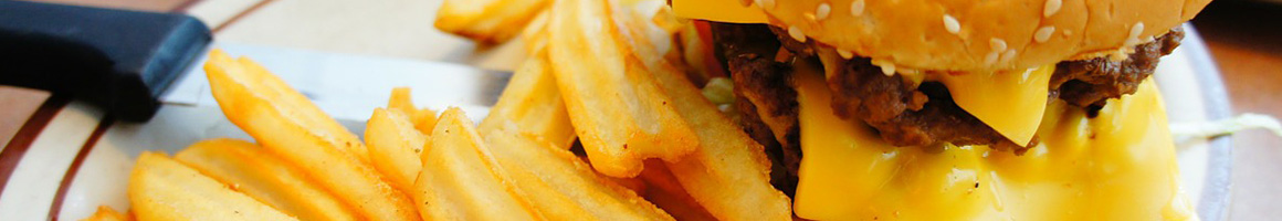 Eating Burger at King's Row Drive In restaurant in Selah, WA.